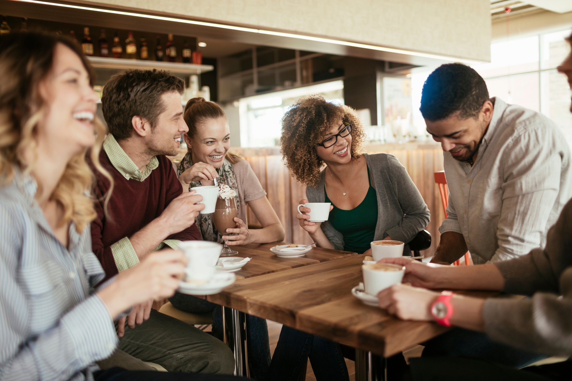 Friends hanging out drinking coffee Friends hanging out drinking coffee